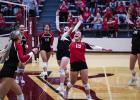 Lady Cubs celebrate teammate Bowers kill shot. Photo by Will Sadler