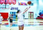 OHS Lady Cubs #24 Angel Turner sends a floater to the net during the Ladycats match up. Photo by Will Sadler