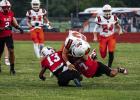 Cubs defenders #13 Reggie Williams and #7 Damian Hernandez bring down a Petrolia Pirate runner during a recent matchup. Photo by Will Sadler
