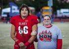 OHS Cub #66 Benny Fuselier was escorted by Melissa Scott. Benny played guard and defensive tackle for the Cubs for 6 years and was known for his outstanding sportsmanship.