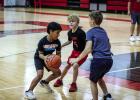 A Cub offensive player practicing driving through defenders to the basket. Photo by Will Sadler
