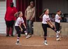 The Lady Cubs know that having fun is mandatory when playing softball in the summer, dancing is a great way to warm up as well. Photo by Will Sadler