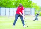 OHS Cub Case Grey putting during district play. Photo by Will Sadler