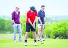 OHS Cub Colby Johnson was laser focused while making this putt during district play. Photo by Will Sadler