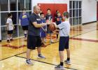 New basketball coach hosts