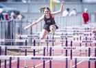 NHS Camren Mallory captures third place in 100m hurdles and second place in 200m. Photo by Will Sadler