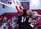 Lady Cubs #14 Angel Turner and #20 Natalie Simmons team up at the net to block against the Lady Indians. Photo by Will Sadler