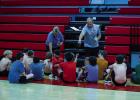 Coach Symank incentivized players by awarding tokens for achieving certain tasks or answering trivia questions correctly. Photo by Will Sadler