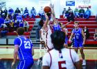 Cubs #13 Pedro Carreon continues to grow with the team and always shows tremendous heart and grit on the court. Shown driving to the basket for a floater. Photo by Will Sadler