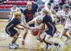 OHS Cubs defenders fight for the ball. The Cubs played with heart, grit, and speed every second of the night. Photo by Will Sadler