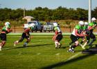 Bobcat offense runs offensive running drills; a successful season takes great passing and running. Photo by Will Sadler