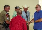 Chief Dan Birbeck speaks with law enforcement peers during his going away luncheon. Photo by Will Sadler
