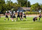 The Bobcats begin practice with special teams working in plenty of kickoffs and extra point kicking. Kicking should be automatic once the ball is hiked and plenty of repetition helps to ensure smooth kicks. Photo by Will Sadler