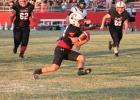 The Cubs’ Kyle Stewart makes a breakaway run during a scoring drive to help the Cubs cement their 42-36 victory over the Archer City Wildcats. Photo by Kailyn Altmiller