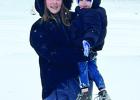 Left: OHS Senior Rae Bond showed 3-year-old little brother how to play in the snow