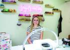 Cterling Hopkins opened a nail service, Nails by Cterling, in the Fringe salon on South Grand Avenue in May. Photo by Will Sadler