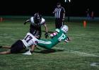 Bobcat #12 Mikey Soito gives maximum effort stretching out his arm to barely get the ball across the goal line, scoring for the Bobcats Photo by Will Sadler