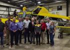 Congressman Roger Williams (in suit and tie, center) met with executives at Air Tractor and Olney leaders on Aug. 25 for a tour of the world’s largest turboprop maker and a town hall with its employees. Photo provided by Office of Rep. Roger Williams