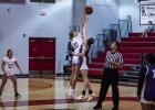 OHS Lady Cub #20 Natalie Simmons tips off against the Lady Buckaroos. Photo by Will Sadler