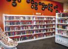 The Teen Room features colorful egg-shaped chairs and shelves of Young Adult books. Photo by Will Sadler