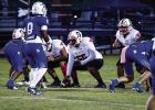 Cub #55 Peyton Bedford playing center enjoys his last year as a Cub. Bedford was out with injury most of the season but recovered in time to finish his time at OHS with fellow Cub’s brothers playing football. Photo by Will Sadler