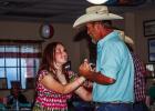 Cub Center Activities Director Candy Blair’s husband Coty Blair enjoys a dance with their granddaughter Melissa Jackson who was in town visiting for the summer. Photo by Will Sadler