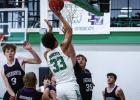 Bobcat #33 Jacob Omundi was in beast mode under the basket, dominating defenders under the bucket during the Greyhound matchup. Photo by Will Sadler