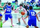 NJH Bobcat #12 Braxton Dobbs breaks for the bucket in heavy Longhorn traffic. Photo by Will Sadler