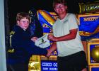 OHS FFA Secretary Kaiden Johnson presents FFA member Luke Lane with the Farm Business Management Degree. Photo by Will Sadler