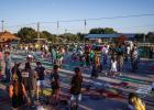 The Newcastle community showed up in force to help Newcastle ISD celebrate HOCO week. One loved tradition is painting the highway at the end of the HOCO Parade. Photo by Will Sadler