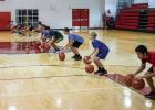 New basketball coach hosts
