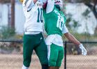 Bobcat defender #10 Keegen Voyles, RB/WR, goes shoulder to shoulder with his Guthrie offensive counterpart and comes away with the interception.