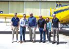 Representatives from Pratt & Whitney Canada award Air Tractor President Jim Hirsch and Thrush Aircraft President Mark McDonald, president and CEO of Thrush Aircraft, with a commemorative award recognizing the companies’ long-standing partnership. Ph