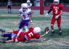 OJH Cub #5 Chris McElroy gives his all, and with a final stretch, the pigskin breaks the line! Photo by Will Sadler