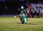 Bobcat #0 London Martinez held the snap for kicker #10 Keegen Voyles, the kick was one of many successful extra point kicks. The Bobcats go on to fold up the Wildcats 73-0 ending the game early then moving on to HOCO festivities. Photo by Will Sadler