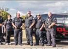 Olney PD pose with the Mayberry Police car