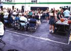 Attendees of the NHS Athletic Banquet enjoyed conversations and reliving memories of the past year of exciting sports events. The auction table was also a hot spot, the items auctioned included signed team photos, balls and other sports memorabilia of the