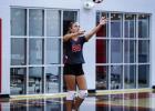 OJH Lady Cub #20 Harper Watson serves during the Lady Indian match. Photo by Will Sadler