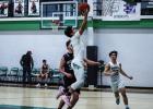 Bobcat #3 Keyton Newland put on an aerial assault against the Greyhounds, shown flying towards the basket for an easy bucket. Photo by Will Sadler