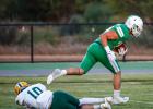 NHS Bobcat #56 Cooper Clayton C/NG caught a bullet off his back heel, quickly dispatched the #10 Guthrie defender, and strolled into the end zone, opening up the first quarter and pressing down a Bobcat gas pedal that never let up till the end of the firs