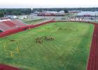 Cub football players began the year’s first practice on the Cub Stadium field, running a few routes before heading to the updated Cub practice field. Photo by Will Sadler