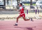 OHS runner Domonique Collins sprints to the finish in the 4x1 relay, pushing hard for teammates for their second-place finish. Photo by Will Sadler