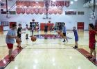 New basketball coach hosts