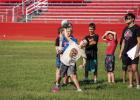 Lil’ Cubs learn new skills at OES football camp