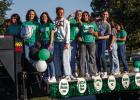NHS Varsity Ladycats Volleyball team wave to the crowd during the Newcastle High School Homecoming Parade on Friday. Photo by Will Sadler