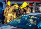 The Olney Volunteer Fire Department using the jaws of life to simulate an extraction of a wreck victim. Photo by Will Sadler