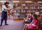 Cowboy Nick Waters had children and adults hanging on every word as he told the tale of one of the many adventures of the Abernathy Boys during the OCLAC’s summer storytelling event. Photo by Will Sadler