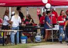 The members of the Olney Athletic Booster Club manned several taco stations, keeping hungry Cubs fans well fed at the Club’s booster event. Photo by Will Sadler