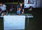 Olney’s Top of Texas Cheerlaaders hekd a bake sale at the Music in May concert, benefitting their sponsor and coach, Karrie Canada. Photo by Will Sadler