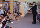 Children of all ages sat spellbound as Ron Wilson the Magician performed his magic act. Photo by Will Sadler